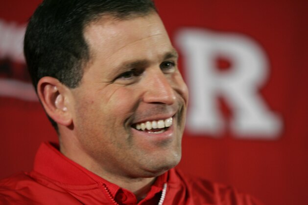 ** FILE ** Rutgers head coach Greg Schiano smiles as he talks the day after his team's victory over No. 3 ranked Louisville during a news conference in Piscataway, N.J., in this Nov. 10, 2006, file photo. While success-starved football fans in New Jersey are embracing Rutgers' run at an unbeaten season with a fervor bordering on hysteria, coach Schiano is already a few steps ahead. One of the moves he hopes to make is to increase Rutgers Stadium's seating capacity to 80,000 _ almost double what it is now. (AP Photo/Mike Derer)