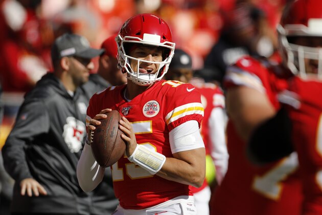 Kansas City Chiefs quarterback Patrick Mahomes (15) warms up before an NFL football game against the Houston Texans in Kansas City, Mo., Sunday, Oct. 13, 2019. (AP Photo/Colin E. Braley)