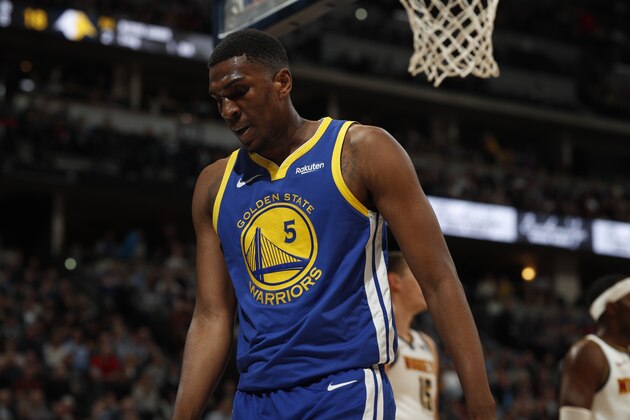 Golden State Warriors forward Kevon Looney (5) in the first half of an NBA basketball game Tuesday, Jan. 15, 2019, in Denver. (AP Photo/David Zalubowski)
