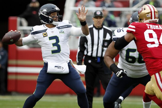 Seattle Seahawks quarterback Russell Wilson (3) passes against the San Francisco 49ers during the first half of an NFL football game in Santa Clara, Calif., Sunday, Dec. 16, 2018. (AP Photo/Tony Avelar)