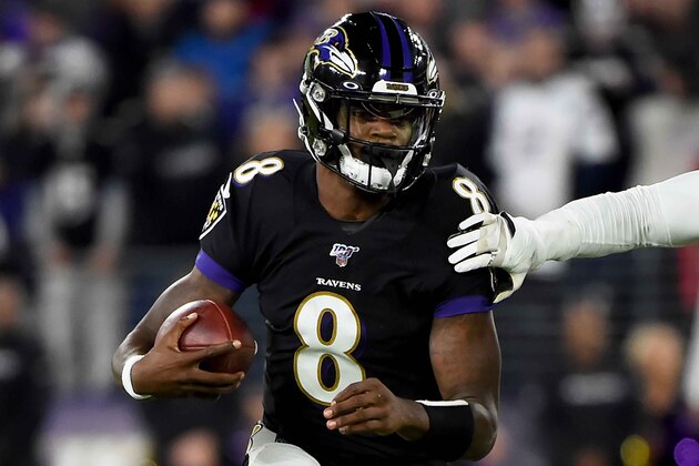 BALTIMORE, MD - NOVEMBER 03: Lamar Jackson #8 of the Baltimore Ravens runs against the New England Patriots during the game at M&T Bank Stadium on November 3, 2019 in Baltimore, Maryland. (Photo by Will Newton/Getty Images)