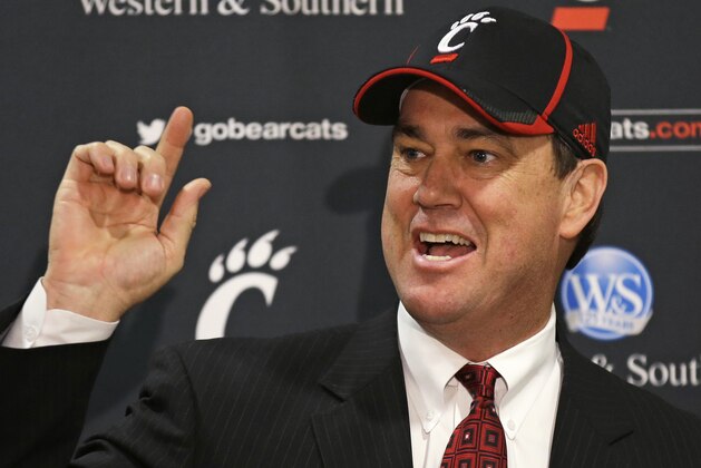 Mike Bohn speaks at a news conference after he was named Cincinnati athletic director, Thursday, Feb. 6, 2014, in Cincinnati. Bohn had been athletic director at Colorado from 2005 to 2013. (AP Photo/Al Behrman)