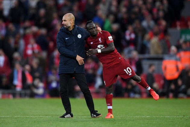 LIVERPOOL, ENGLAND - OCTOBER 07:  Josep Guardiola, Manager of Manchester City embraces Sadio Mane of Liverpool after the Premier League match between Liverpool FC and Manchester City at Anfield on October 7, 2018 in Liverpool, United Kingdom.  (Photo by Laurence Griffiths/Getty Images)
