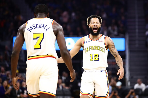 SAN FRANCISCO, CALIFORNIA - NOVEMBER 04:  Ky Bowman #12 congratulates Eric Paschall #7 of the Golden State Warriors after he made a basket against the Portland Trail Blazers at Chase Center on November 04, 2019 in San Francisco, California. NOTE TO USER: User expressly acknowledges and agrees that, by downloading and or using this photograph, User is consenting to the terms and conditions of the Getty Images License Agreement. (Photo by Ezra Shaw/Getty Images)