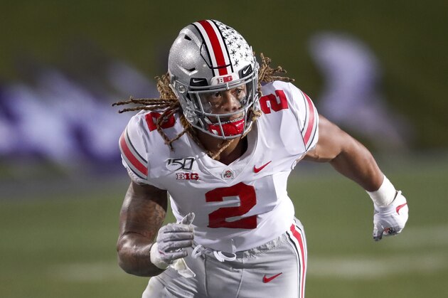Ohio State defensive end Chase Young rushes the Northwestern quarterback during the second half of an NCAA college football game Friday, Oct. 18, 2019, in Evanston, Ill. (AP Photo/Charles Rex Arbogast)