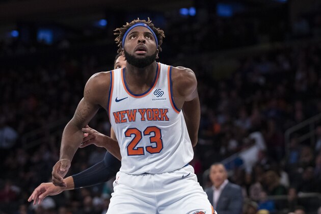 New York Knicks center Mitchell Robinson vies for position during a free throw in the first half of a preseason NBA basketball game against the New Orleans Pelicans, Friday, Oct. 18, 2019, at Madison Square Garden in New York. (AP Photo/Mary Altaffer)