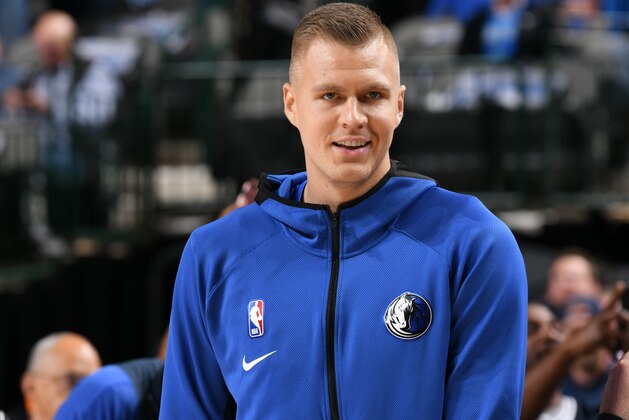 DALLAS, TX - OCTOBER 11: Kristaps Porzingis #6 of the Dallas Mavericks smiles before game against the Orlando Magic on October 11, 2019 at the American Airlines Center in Dallas, Texas. NOTE TO USER: User expressly acknowledges and agrees that, by downloading and or using this photograph, User is consenting to the terms and conditions of the Getty Images License Agreement. Mandatory Copyright Notice: Copyright 2019 NBAE (Photo by Glenn James/NBAE via Getty Images)