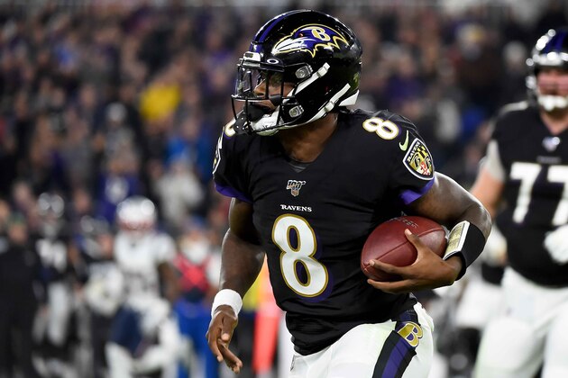 BALTIMORE, MD - NOVEMBER 03: Lamar Jackson #8 of the Baltimore Ravens runs against the New England Patriots during the game at M&T Bank Stadium on November 3, 2019 in Baltimore, Maryland. (Photo by Will Newton/Getty Images)