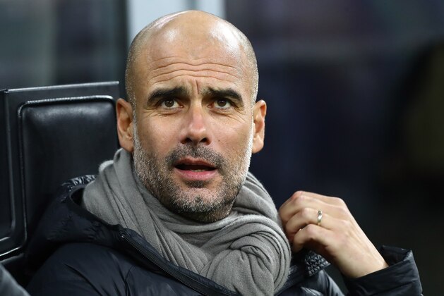 MILAN, ITALY - NOVEMBER 06:  Manchester City coach Josep Guardiola looks on before the UEFA Champions League group C match between Atalanta and Manchester City at Stadio Giuseppe Meazza on November 6, 2019 in Milan, Italy.  (Photo by Marco Luzzani/Getty Images)