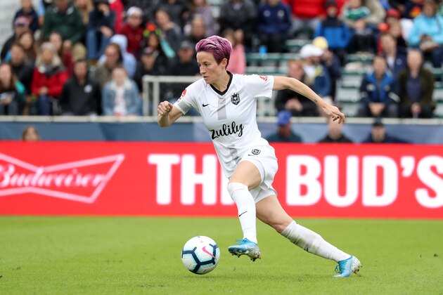 CARY, NC - OCTOBER 20: Megan Rapinoe #15 of Reign FC plays the ball during a game between Reign FC and North Carolina Courage at Sahlen's Stadium at WakeMed Soccer Park on October 20, 2019 in Cary, North Carolina. (Photo by Andy Mead/ISI Photos/Getty Images).
