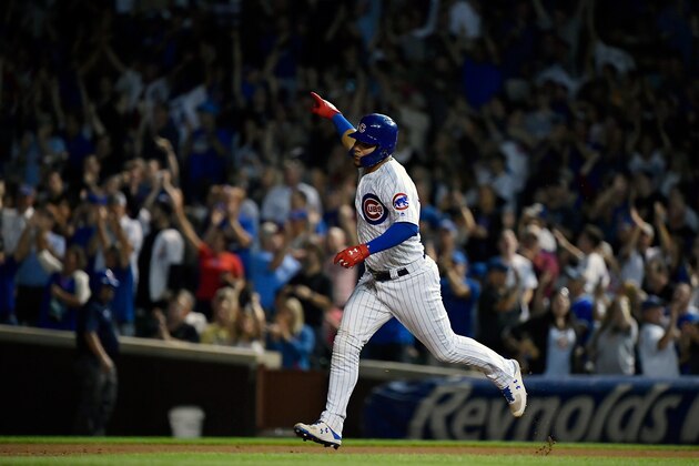 CHICAGO, ILLINOIS - SEPTEMBER 18: Willson Contreras #40 of the Chicago Cubs reacts after hitting a home run in the seventh inning against the Cincinnati Reds at Wrigley Field on September 18, 2019 in Chicago, Illinois. (Photo by Quinn Harris/Getty Images)