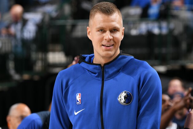 DALLAS, TX - OCTOBER 11: Kristaps Porzingis #6 of the Dallas Mavericks smiles before game against the Orlando Magic on October 11, 2019 at the American Airlines Center in Dallas, Texas. NOTE TO USER: User expressly acknowledges and agrees that, by downloading and or using this photograph, User is consenting to the terms and conditions of the Getty Images License Agreement. Mandatory Copyright Notice: Copyright 2019 NBAE (Photo by Glenn James/NBAE via Getty Images)