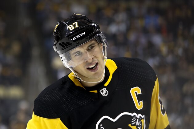 Pittsburgh Penguins' Sidney Crosby prepares to take a face-off during the second period of an NHL hockey game against the Anaheim Ducks in Pittsburgh, Thursday, Oct. 10, 2019. (AP Photo/Gene J. Puskar)
