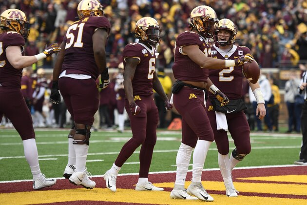 MINNEAPOLIS, MINNESOTA - NOVEMBER 09: Wide receiver Seth Green #17 of the Minnesota Golden Gophers celebrates his rushing touchdown with teammates against the Penn State Nittany Lions during the fourth quarter at TCFBank Stadium on November 09, 2019 in Minneapolis, Minnesota. (Photo by Hannah Foslien/Getty Images)