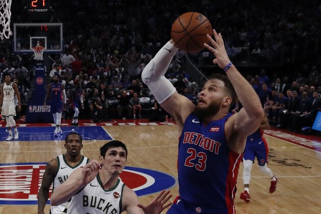 Detroit Pistons forward Blake Griffin makes a layup as Milwaukee Bucks forward Ersan Ilyasova (77) defends during the first half of Game 4 of a first-round NBA basketball playoff series, Monday, April 22, 2019, in Detroit. (AP Photo/Carlos Osorio)