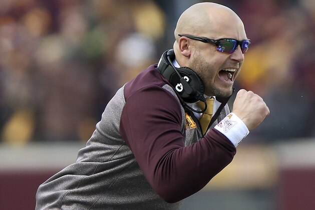 Minnesota head coach P.J. Fleck cheers his team during an NCAA college football game against Penn State, Saturday, Nov. 9, 2019, in Minneapolis. Minnesota won 31-26. (AP Photo/Stacy Bengs)