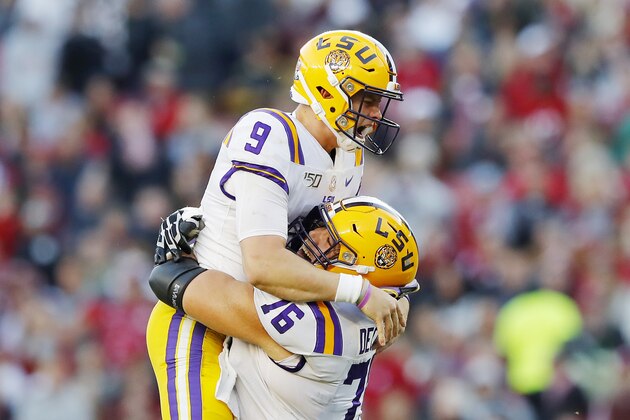 TUSCALOOSA, ALABAMA - NOVEMBER 09: Joe Burrow #9 of the LSU Tigers celebrates after throwing a 13-yard touchdown pass during the second quarter against the Alabama Crimson Tide in the game at Bryant-Denny Stadium on November 09, 2019 in Tuscaloosa, Alabama. (Photo by Kevin C. Cox/Getty Images)