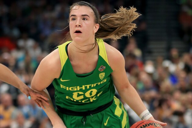 TAMPA, FLORIDA - APRIL 05:  Sabrina Ionescu #20 of the Oregon Ducks drives to the basket against the Baylor Lady Bears during the first half in the semifinals of the 2019 NCAA Women's Final Four at Amalie Arena on April 05, 2019 in Tampa, Florida. (Photo by Mike Ehrmann/Getty Images)