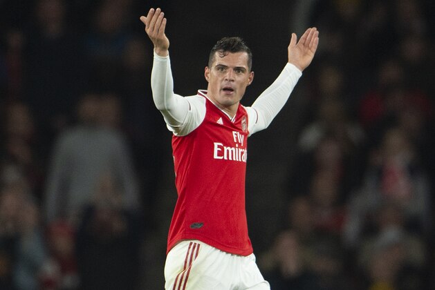 LONDON, ENGLAND - OCTOBER 27: Granit Xhaka of Arsenal reacts to the crowd after being substituted by Manager  Unai Emery during the Premier League match between Arsenal FC and Crystal Palace at Emirates Stadium on October 27, 2019 in London, United Kingdom. (Photo by Visionhaus)