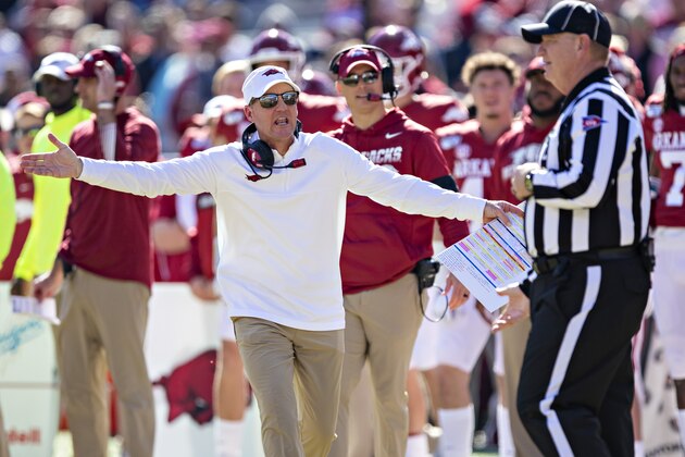FAYETTEVILLE, AR - NOVEMBER 9:   Head Coach Chad Morris of the Arkansas Razorbacks yells at the official during the second half of a game against the Western Kentucky Hilltoppers at Razorback Stadium on November 9, 2019 in Fayetteville, Arkansas.  The Hilltoppers defeated the Razorbacks 45-19.  (Photo by Wesley Hitt/Getty Images)