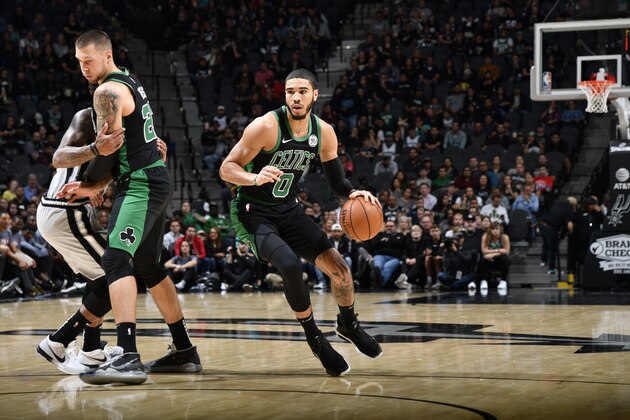 SAN ANTONIO, TX - NOVEMBER 9: Jayson Tatum #0 of the Boston Celtics handles the ball against the San Antonio Spurs on November 9, 2019 at the AT&T Center in San Antonio, Texas. NOTE TO USER: User expressly acknowledges and agrees that, by downloading and or using this photograph, user is consenting to the terms and conditions of the Getty Images License Agreement. Mandatory Copyright Notice: Copyright 2019 NBAE (Photos by Logan Riely/NBAE via Getty Images)