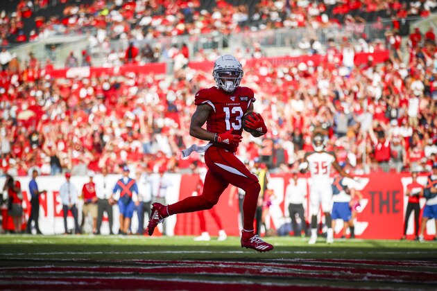 TAMPA, FL - NOVEMBER 10: Christian Kirk #13 of the Arizona Cardinals holds on to the pass from Kyler Murray #1 for a touchdown in the fourth quarter during the game against the Tampa Bay Buccaneers on November 10, 2019 at Raymond James Stadium in Tampa, Florida. (Photo by Will Vragovic/Getty Images)