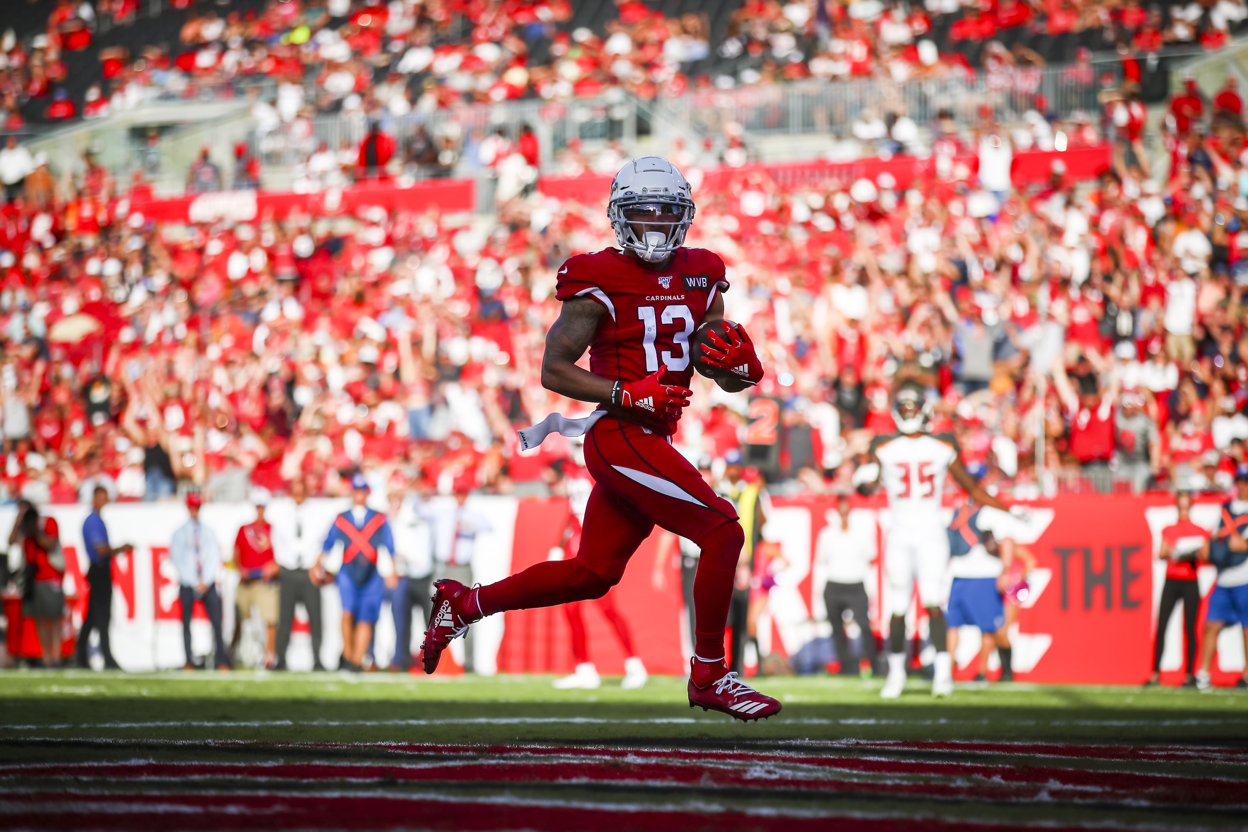 TAMPA, FL - NOVEMBER 10: Christian Kirk #13 of the Arizona Cardinals holds on to the pass from Kyler Murray #1 for a touchdown in the fourth quarter during the game against the Tampa Bay Buccaneers on November 10, 2019 at Raymond James Stadium in Tampa, Florida. (Photo by Will Vragovic/Getty Images)