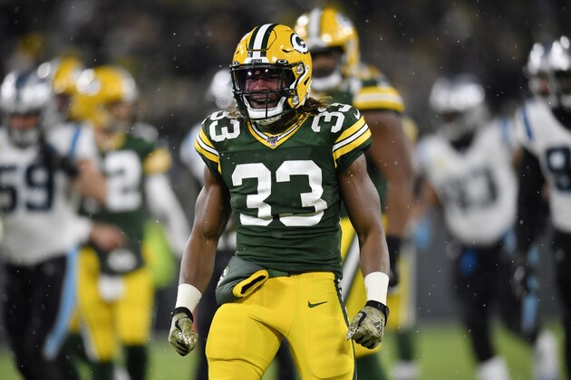 GREEN BAY, WISCONSIN - NOVEMBER 10: Aaron Jones #33 of the Green Bay Packers reacts after his first down in the second half against the Carolina Panthers at Lambeau Field on November 10, 2019 in Green Bay, Wisconsin. (Photo by Quinn Harris/Getty Images)