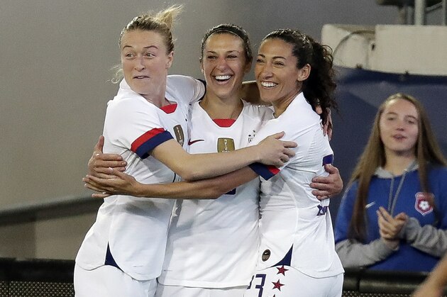 U.S. forward Carli Lloyd, center, celebrates her goal against the Costa Rica with Emily Sonnett, left, and Christen Press during the first half of an international friendly soccer match Sunday, Nov. 10, 2019, in Jacksonville, Fla. (AP Photo/John Raoux)