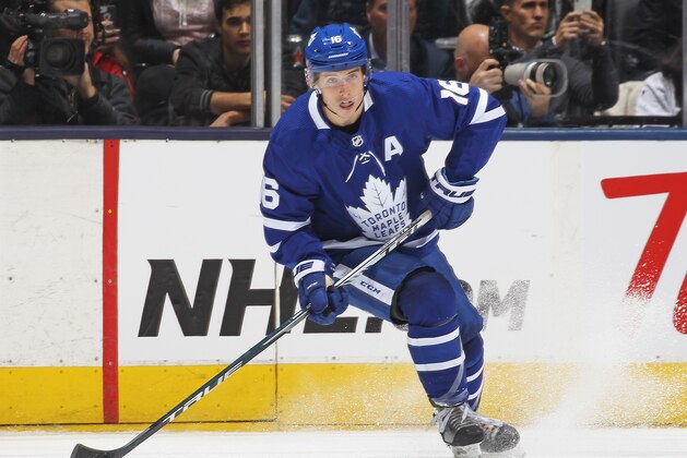 TORONTO, ON - NOVEMBER 7:  Mitchell Marner #16 of the Toronto Maple Leafs turns with the puck against the Vegas Golden Knights during an NHL game at Scotiabank Arena on November 7, 2019 in Toronto, Ontario, Canada. The Maple Leafs defeated the Golden Knights 2-1 in overtime. (Photo by Claus Andersen/Getty Images)