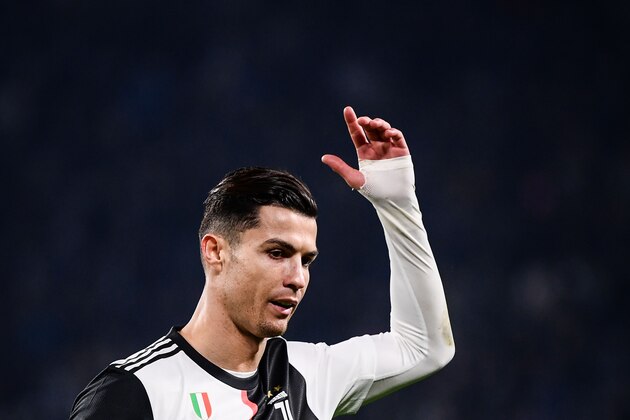 Juventus' Portuguese forward Cristiano Ronaldo acknowledges the public as he leaves the pitch to be substituted during the Italian Serie A football match Juventus vs AC Milan on November 10, 2019 at the Juventus Allianz stadium in Turin. (Photo by Marco Bertorello / AFP) (Photo by MARCO BERTORELLO/AFP via Getty Images)