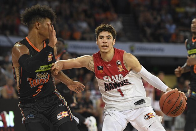 CAIRNS, AUSTRALIA - NOVEMBER 09: LaMelo Ball of the Hawks looks to get past Scott Machado of the Taipans during the round six NBL match between the Cairns Taipans and the Illawarra Hawks at the Cairns Convention Centre on November 09, 2019 in Cairns, Australia. (Photo by Ian Hitchcock/Getty Images)