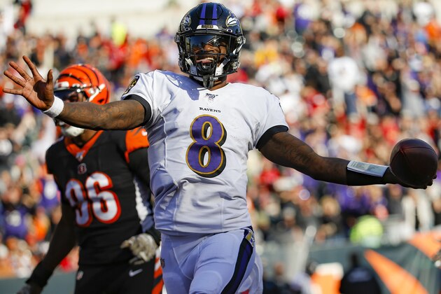 Baltimore Ravens quarterback Lamar Jackson (8) celebrates his touchdown during the second half of NFL football game against the Cincinnati Bengals, Sunday, Nov. 10, 2019, in Cincinnati. (AP Photo/Frank Victores)