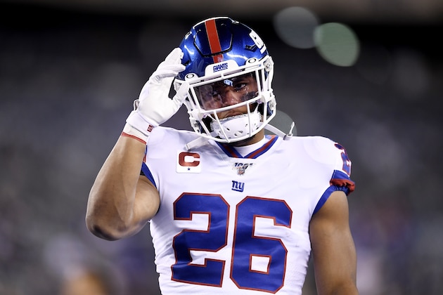EAST RUTHERFORD, NEW JERSEY - NOVEMBER 04: Saquon Barkley #26 of the New York Giants looks on during warmups against the Dallas Cowboys at MetLife Stadium on November 04, 2019 in East Rutherford, New Jersey. (Photo by Sarah Stier/Getty Images)