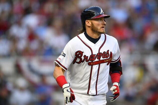 Atlanta Braves' Josh Donaldson hits a home run during the fourth inning of Game 5 of their National League Division Series baseball game against the St. Louis Cardinals, Wednesday, Oct. 9, 2019, in Atlanta. (AP Photo/John Amis)