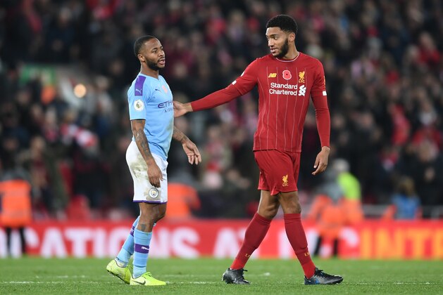 LIVERPOOL, ENGLAND - NOVEMBER 10:  Raheem Sterling of Manchester City speaks with Joe Gomez of Liverpool following the Premier League match between Liverpool FC and Manchester City at Anfield on November 10, 2019 in Liverpool, United Kingdom. (Photo by Laurence Griffiths/Getty Images)