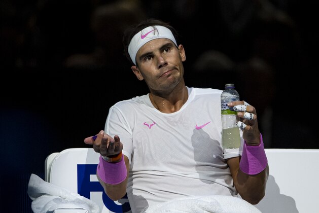 LONDON, ENGLAND - NOVEMBER 11: Rafael Nadal of Spain looks frustrated as he looks to his team during a change of ends during his match against Alexander Zverev of Germany during Day Two of the Nitto ATP World Tour Finals at The O2 Arena on November 11, 2019 in London, England. (Photo by TPN/Getty Images)