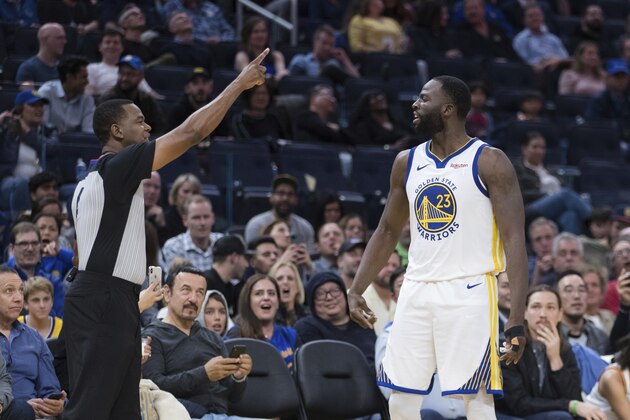 Official Sean Wright, left, ejects Golden State Warriors forward Draymond Green in the second half of an NBA basketball game against the Utah Jazz in San Francisco, Monday, Nov. 11, 2019. The Jazz won 122-108. (AP Photo/John Hefti)