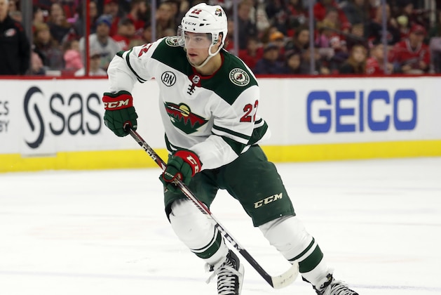 Minnesota Wild's Kevin Fiala (22) moves the puck against the Carolina Hurricanes during the second period of an NHL hockey game, Saturday, March 23, 2019, in Raleigh, N.C. (AP Photo/Karl B DeBlaker)