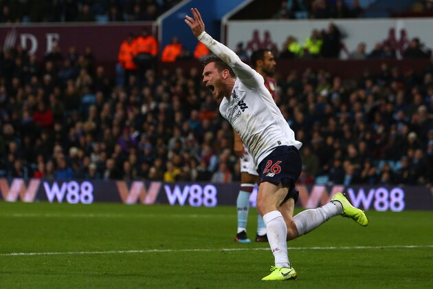 Liverpool's Scottish defender Andrew Robertson celebrates scoring his team's first goal during the English Premier League football match between Aston Villa and Liverpool at Villa Park in Birmingham, central England on November 2, 2019. (Photo by GEOFF CADDICK / AFP) / RESTRICTED TO EDITORIAL USE. No use with unauthorized audio, video, data, fixture lists, club/league logos or 'live' services. Online in-match use limited to 120 images. An additional 40 images may be used in extra time. No video emulation. Social media in-match use limited to 120 images. An additional 40 images may be used in extra time. No use in betting publications, games or single club/league/player publications. /  (Photo by GEOFF CADDICK/AFP via Getty Images)