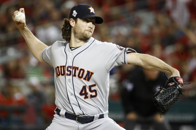 Houston Astros starting pitcher Gerrit Cole throws against the Washington Nationals during the first inning of Game 5 of the baseball World Series Sunday, Oct. 27, 2019, in Washington. (AP Photo/Patrick Semansky)