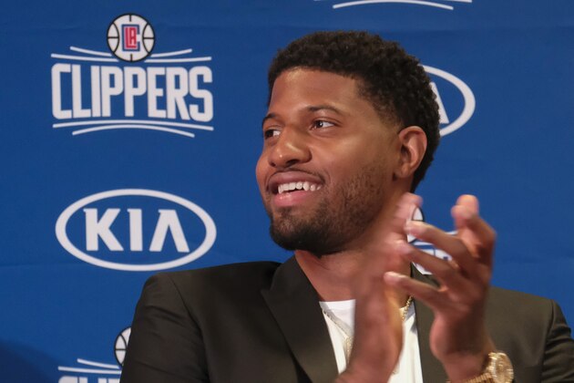 Los Angeles Clippers NBA basketball team introduce Paul George at a press conference at the Green Meadows Recreation Center in Los Angeles, Wednesday, July 23, 2019. (AP Photo/Ringo H.W. Chiu)