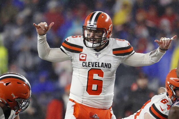 Cleveland Browns quarterback Baker Mayfield gives signals at the line of scrimmage against the New England Patriots during an NFL football game, Sunday, Oct. 27, 2019 in Foxborough, Mass. (Winslow Townson/AP Images for Panini)