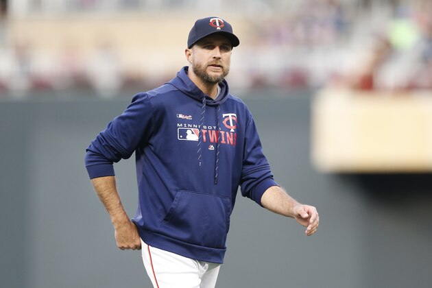 Minnesota Twins manager Rocco Baldelli returns to the dugout after a mound visit against the Oakland Athletics in a baseball game Saturday, July 20, 2019, in Minneapolis. (AP Photo/Jim Mone)