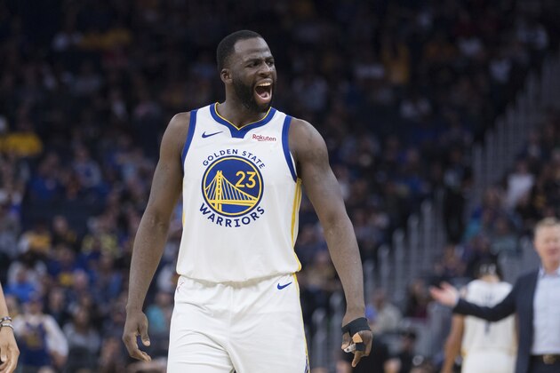 Golden State Warriors forward Draymond Green (23) reacts after he is called for a foul against Utah Jazz guard Mike Conley in the second half of an NBA basketball game in San Francisco, Monday, Nov. 11, 2019. The Jazz won 122-108. (AP Photo/John Hefti)