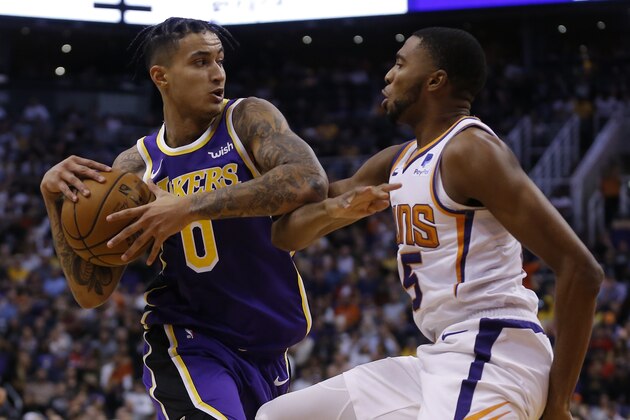 Los Angeles Lakers forward Kyle Kuzma (0) in the first half during an NBA basketball game against the Phoenix Suns, Tuesday, Nov. 12, 2019, in Phoenix. (AP Photo/Rick Scuteri)