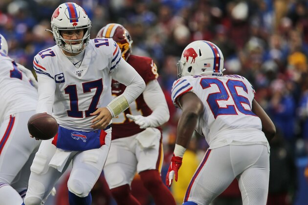 Buffalo Bills quarterback Josh Allen (17) hands the ball off to running back Devin Singletary (26) during the second half of an NFL football game against the Washington Redskins, Sunday, Nov. 3, 2019, in Orchard Park, N.Y. (AP Photo/John Munson)