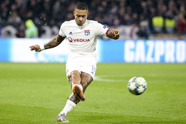 LYON, FRANCE - NOVEMBER 5: Memphis Depay of Lyon during the UEFA Champions League group G match between Olympique Lyonnais (OL) and SL Benfica at Groupama Stadium on November 5, 2019 in Decines near Lyon, France. (Photo by Jean Catuffe/Getty Images)