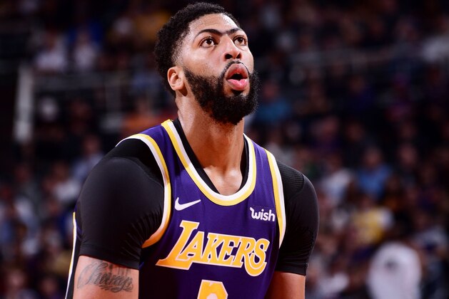 PHOENIX, AZ - NOVEMBER 12: Anthony Davis #3 of the Los Angeles Lakers shoots a free throw during the game against the Phoenix Suns on November 12, 2019 at Talking Stick Resort Arena in Phoenix, Arizona. NOTE TO USER: User expressly acknowledges and agrees that, by downloading and or using this photograph, user is consenting to the terms and conditions of the Getty Images License Agreement. Mandatory Copyright Notice: Copyright 2019 NBAE (Photo by Michael Gonzales/NBAE via Getty Images)