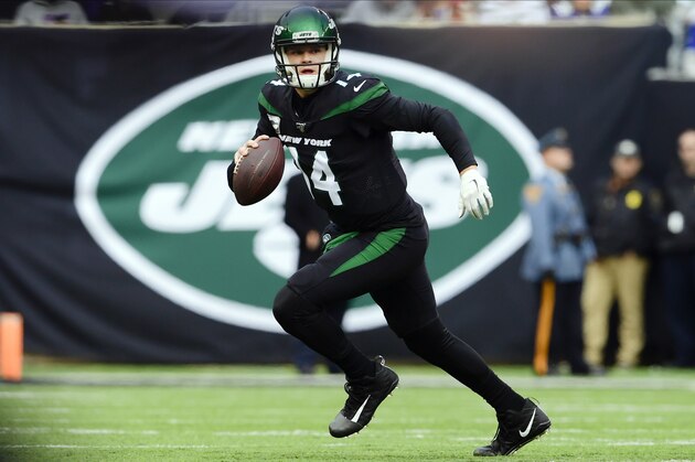 New York Jets quarterback Sam Darnold (14) runs during the first half of an NFL football game against the New York Giants, Sunday, Nov. 10, 2019, in East Rutherford, N.J. (AP Photo/Steven Ryan)